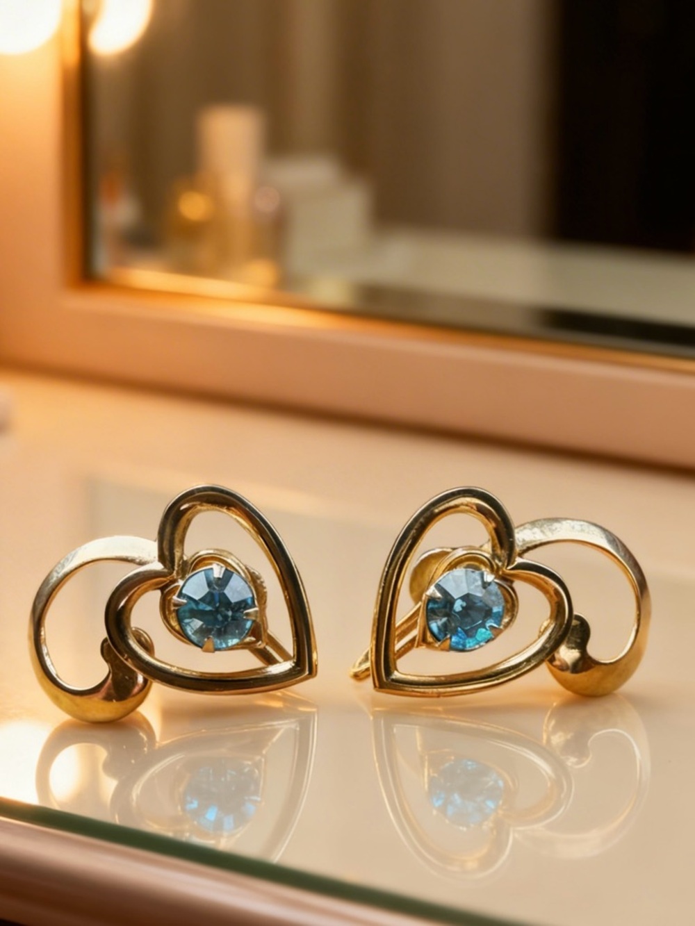 Gold Heart Earrings with Blue Crystal Accent